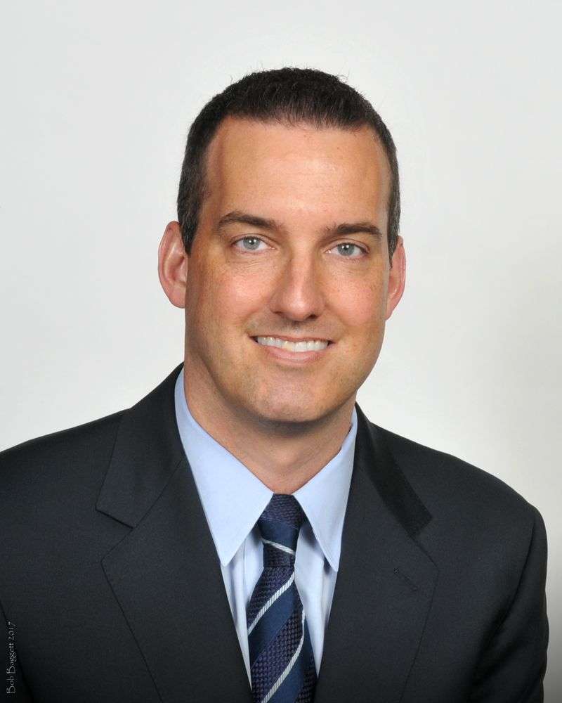 Professional portrait — real estate or financial professional headshot, Tampa
