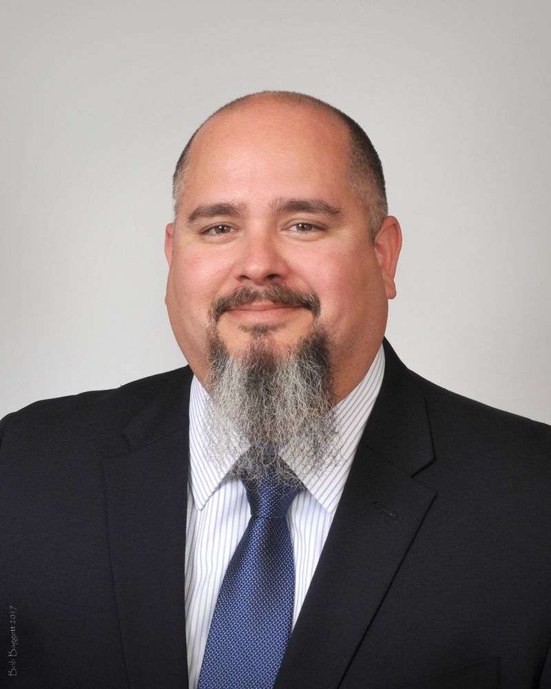 Corporate headshot Tampa — business professional in office setting